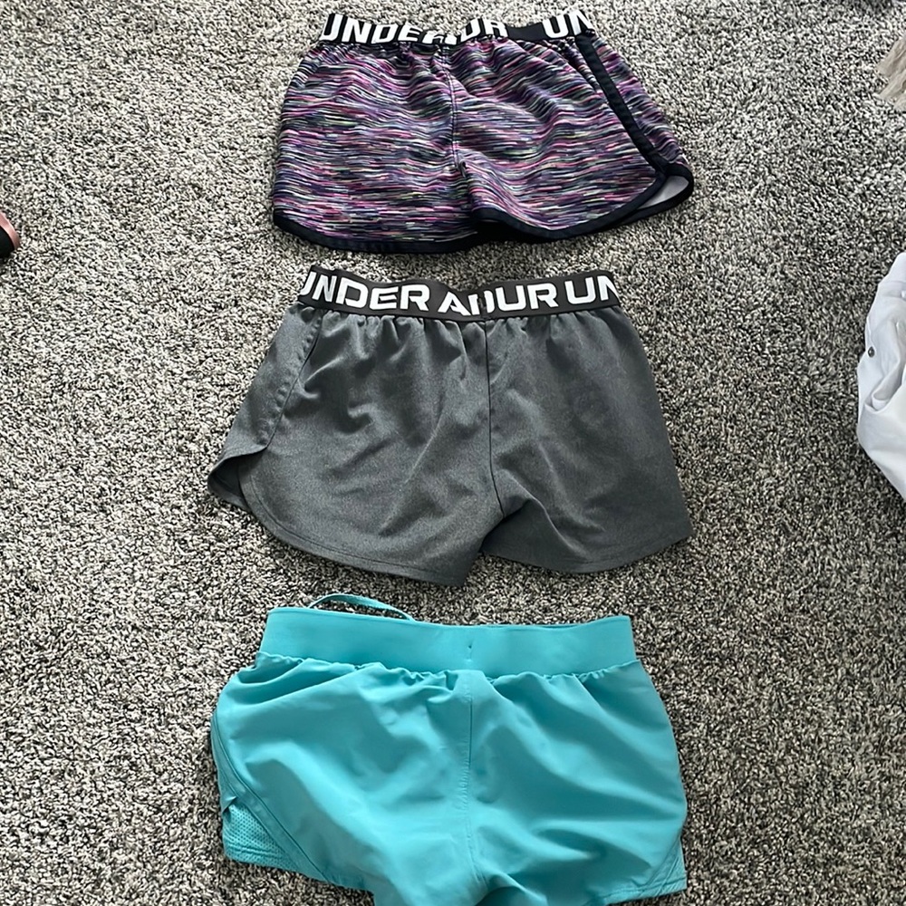 3 pairs of under armour shorts, barley used and have no stains or any problems.